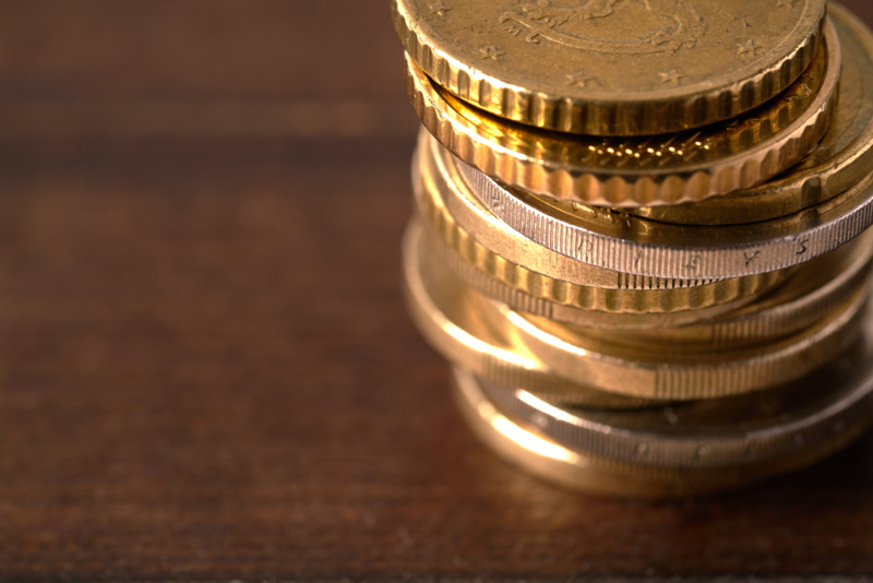 Euro coins stacked on each other in different positions