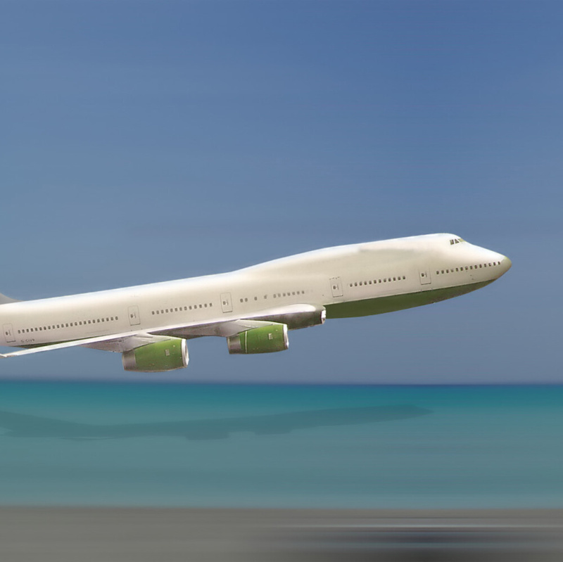 Airplane over beach
